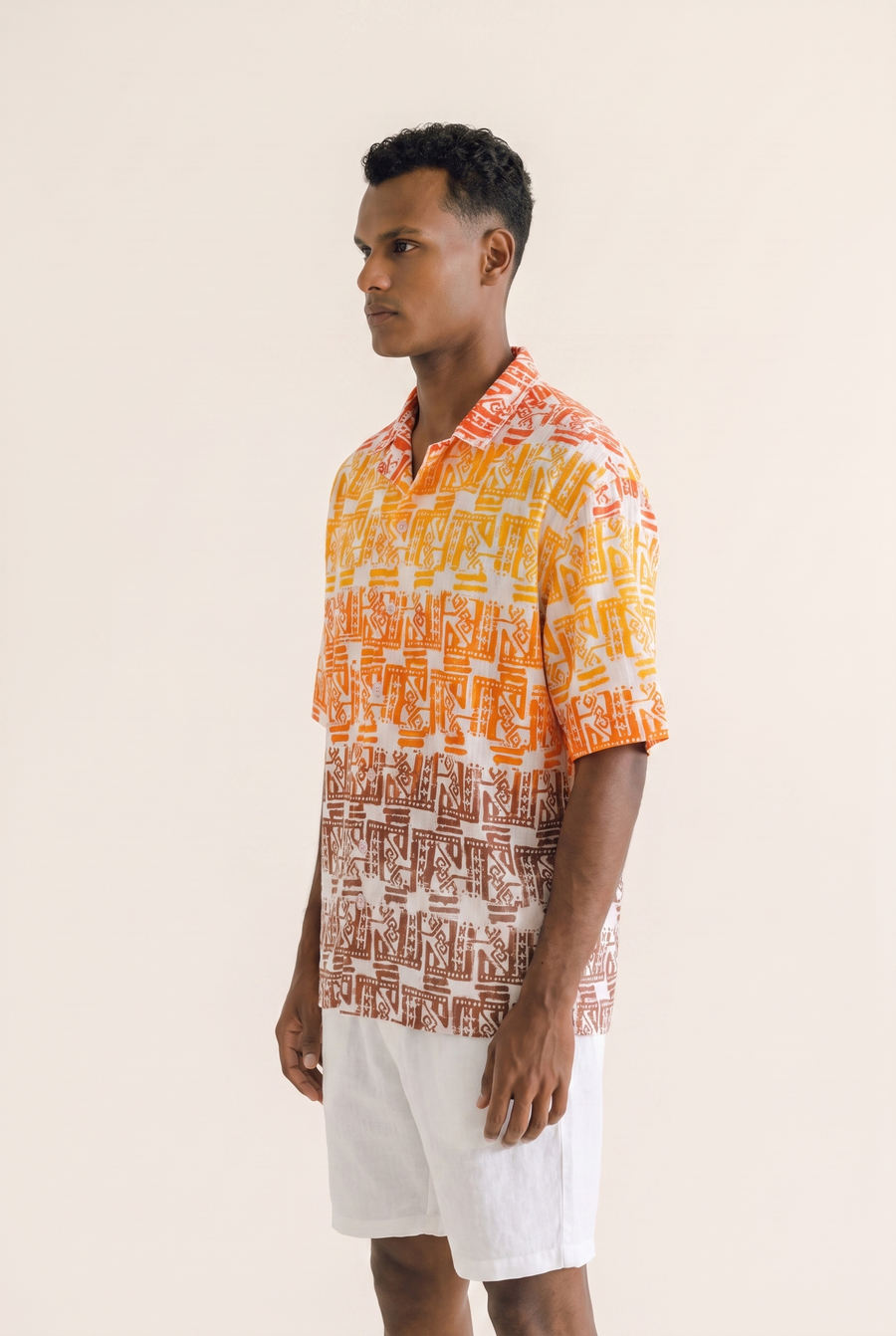 Orange Flow button-up shirt, alternate view showing the flowing drape.
