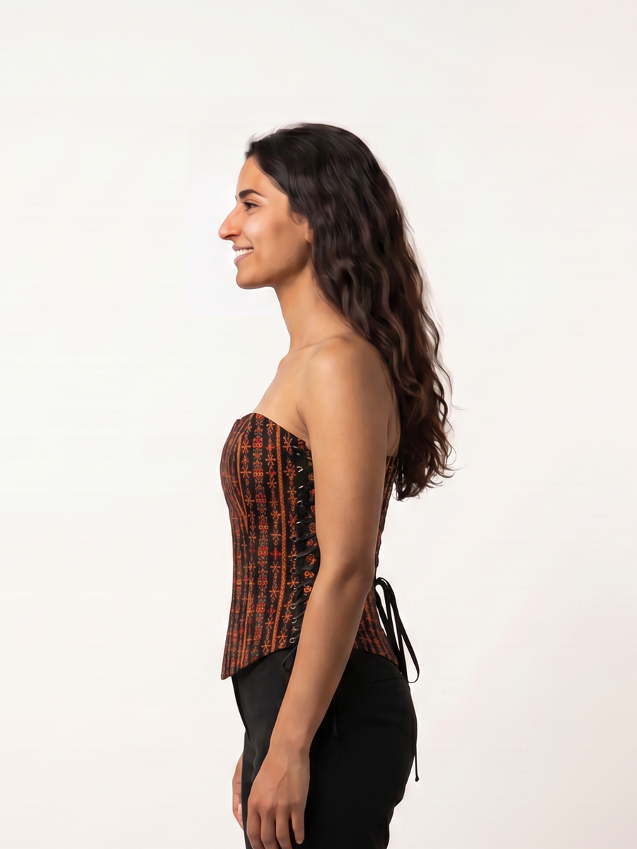 Side view of the Siwi Stitches Corset showing the sweetheart neckline and lace-up waist ties