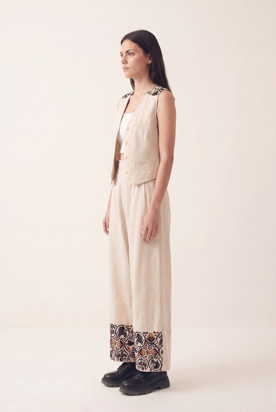 Beige oversized embroidered pants, side view