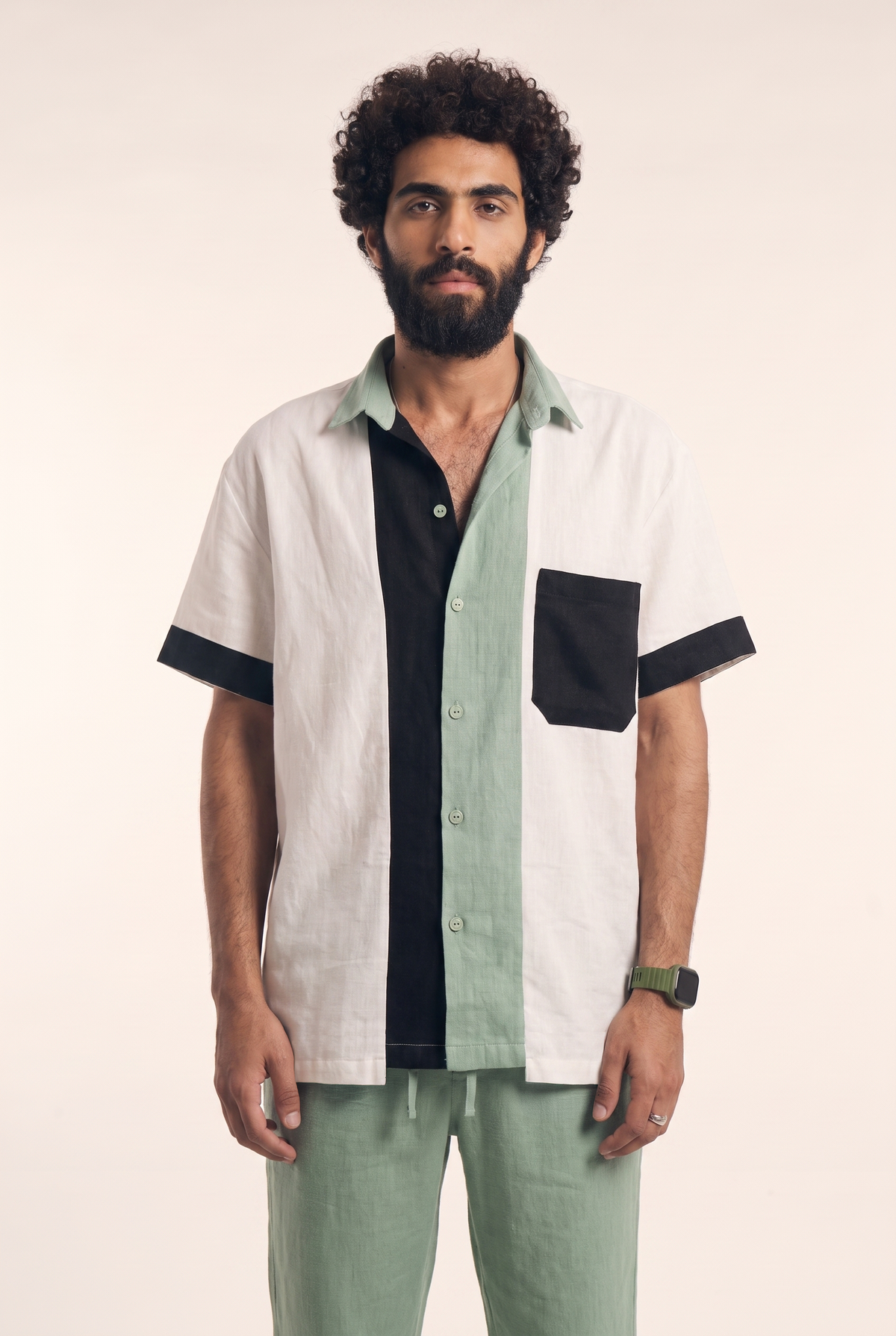 Offwhite, mint green and black linen button-up, front flat lay