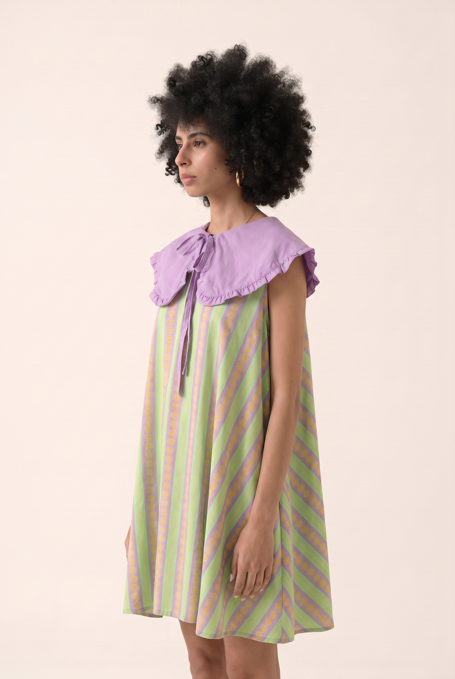 Blue Dune midi dress, alternate view of the pleated silhouette.