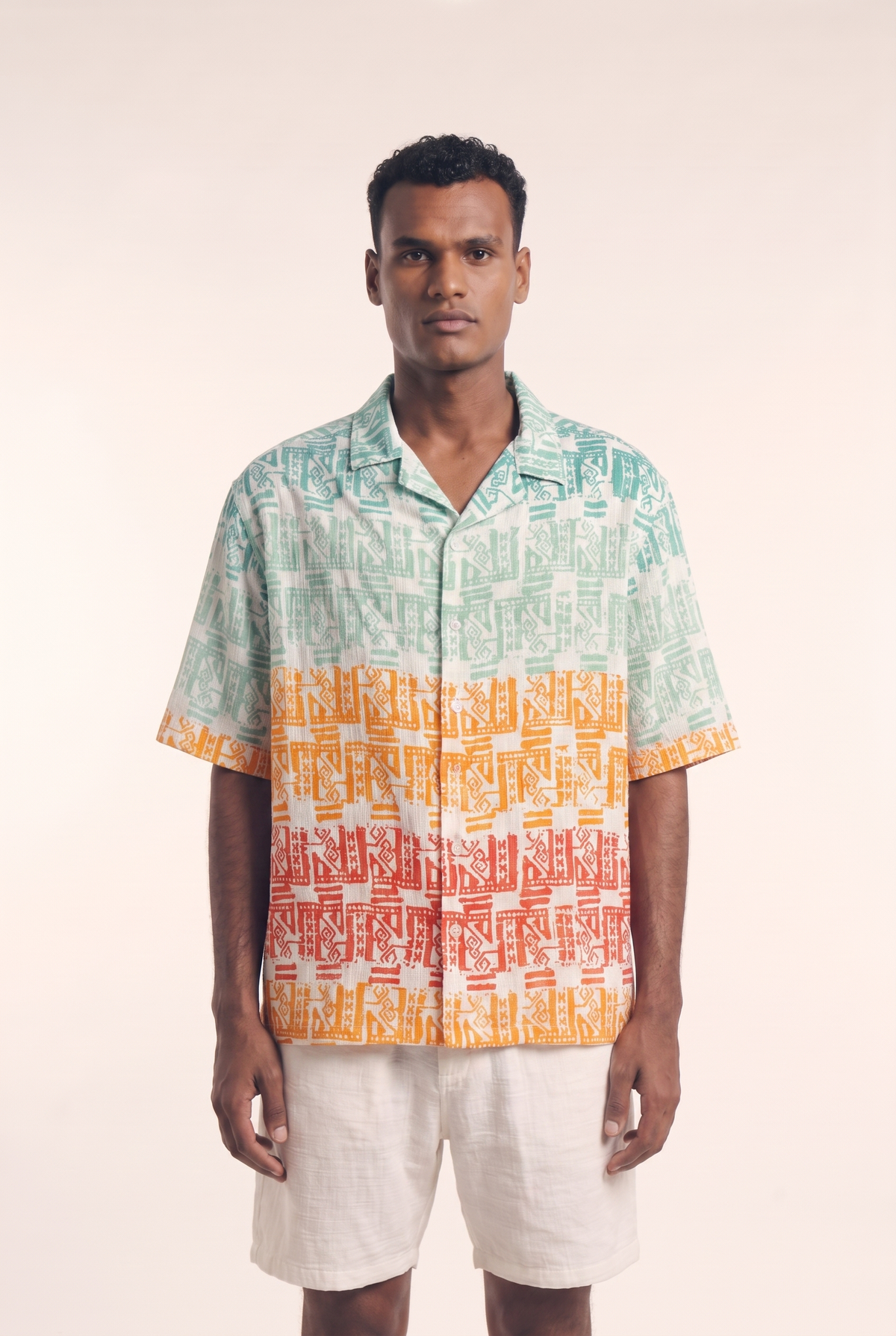 Blue Flow button-up shirt with vibrant draped silhouette, front view.
