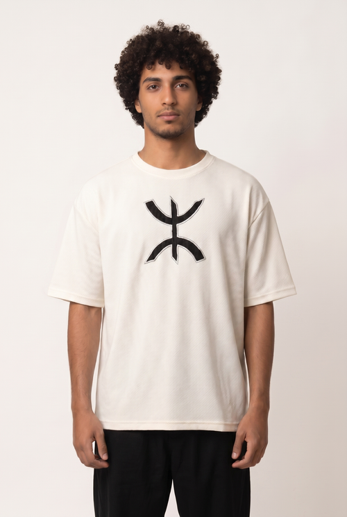 White Free Spirit Tshirt with stitched Yaz symbol emblem on the chest, front view