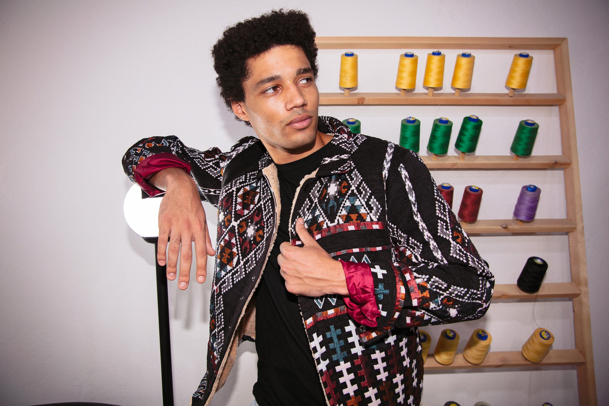 Nubié Colors Jacket close-up - intricate geometric Nubian rug-inspired pattern