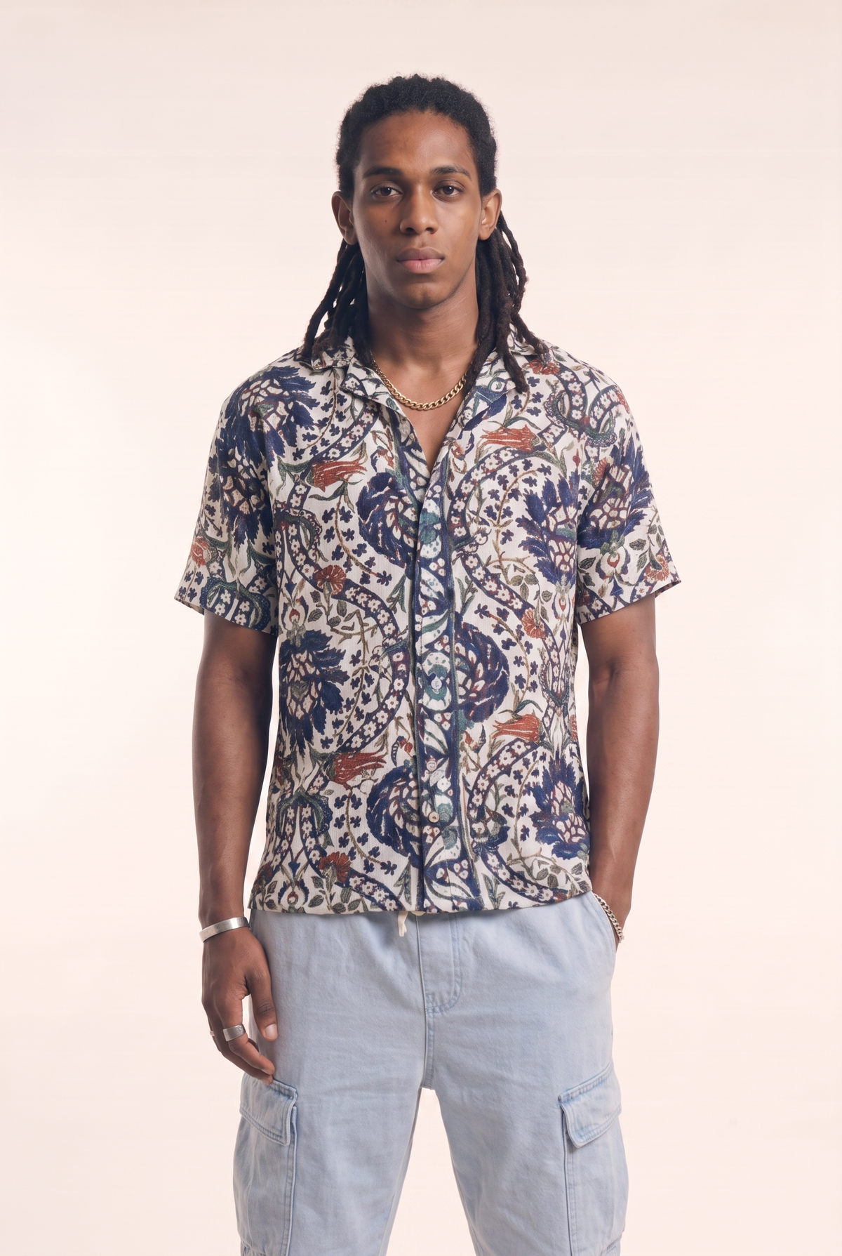 Beige button-up shirt with garden trees pattern, front flat lay