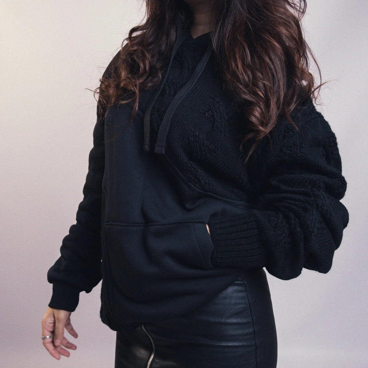 Black mixed fabric hoodie, close up of the fabric