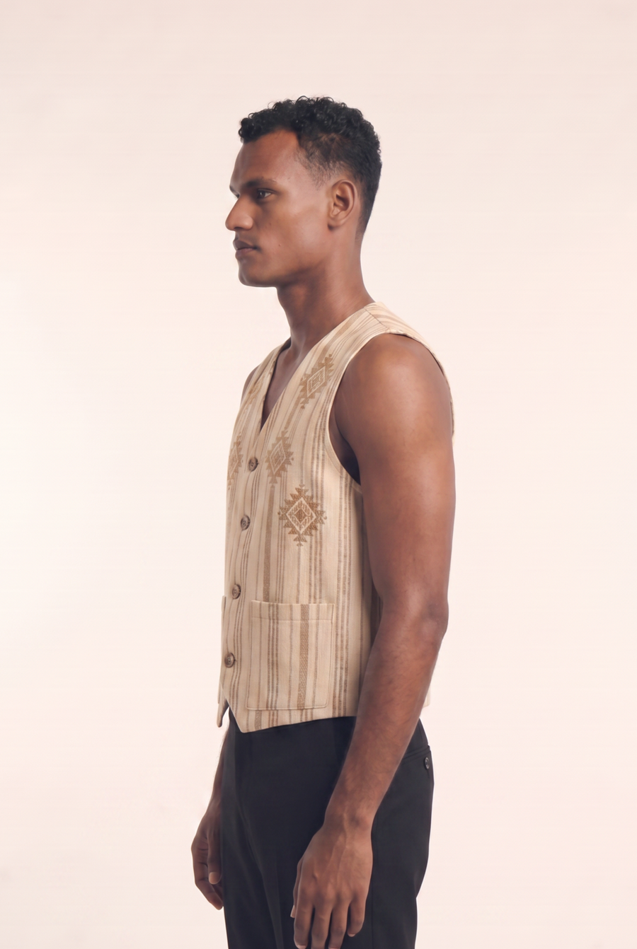 Nubian Vest sleeveless jacket, alternate view of the tailored V-neck.