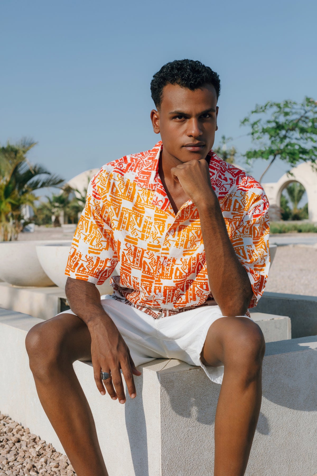 Orange Flow button-up shirt worn, styled view.