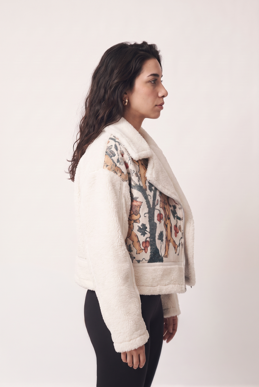 Fur jacket with Coptic angel motif pattern, side view