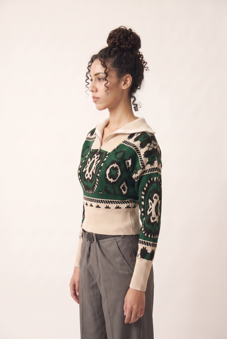Winter Sash Sweater pullover, side view showing the elegant neckline.