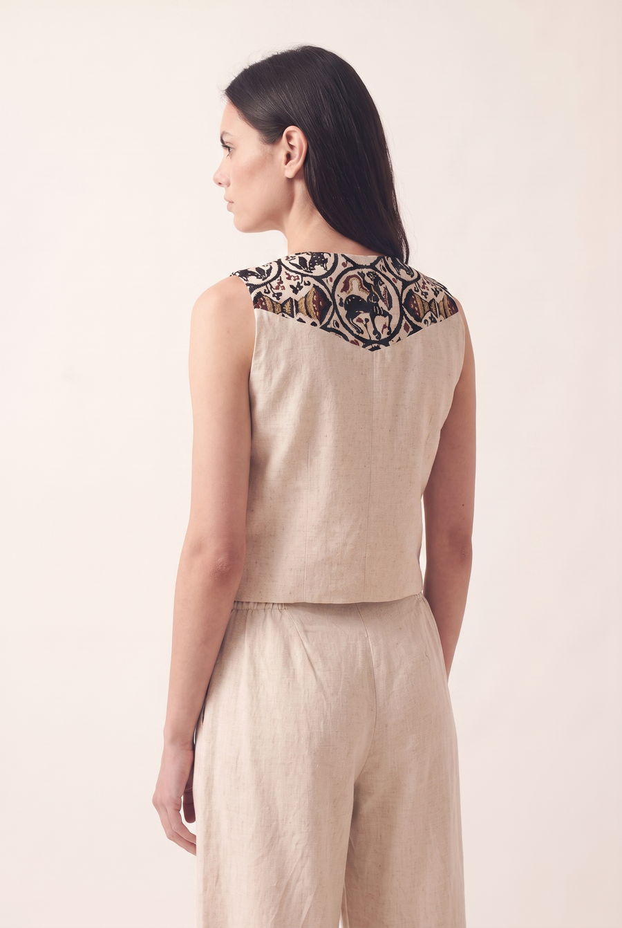 Beige oversized embroidered vest, back view
