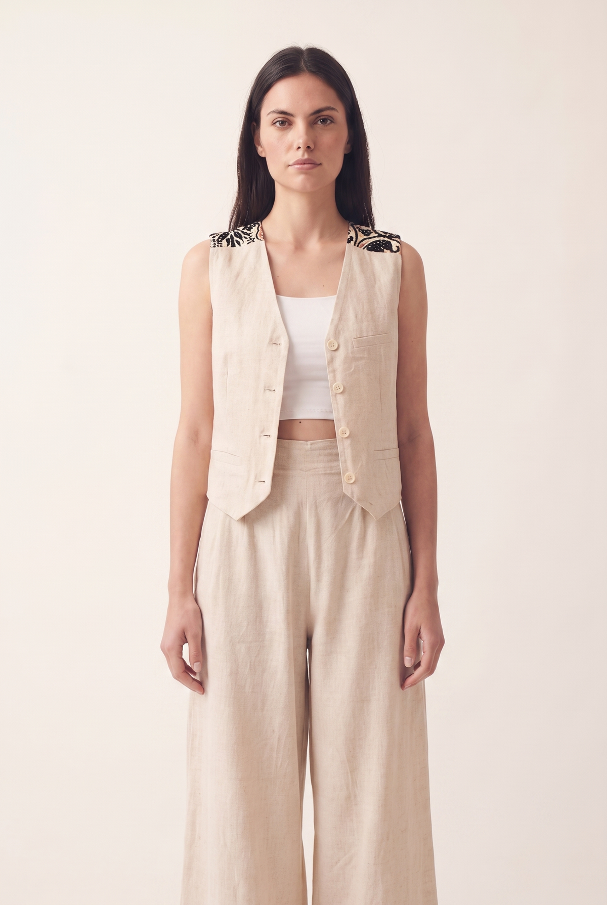Beige oversized embroidered vest, front view
