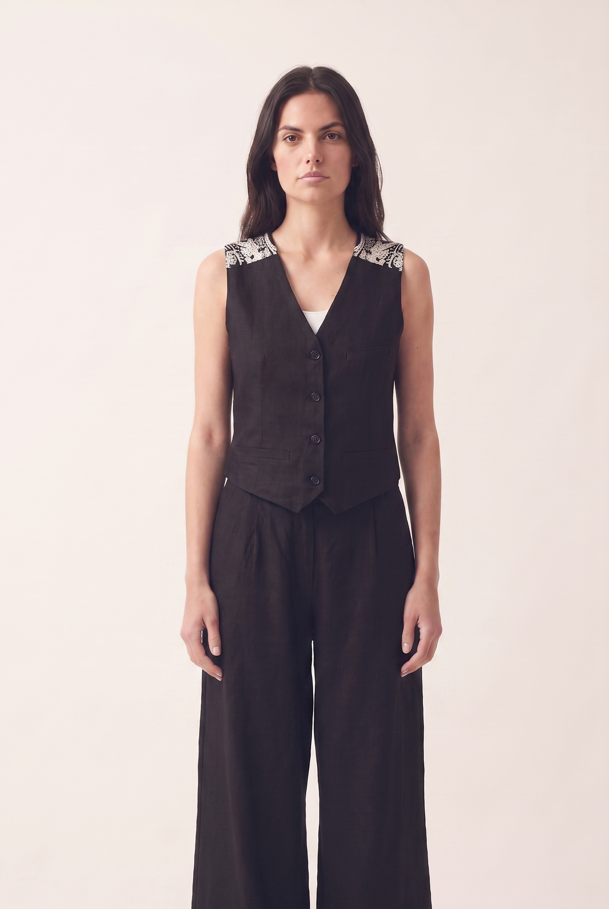 Black oversized embroidered vest, front view